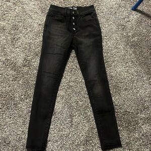 Black wash skinny jeggings in size 10